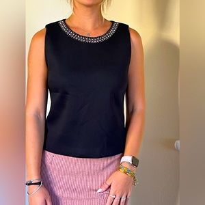 Nice cute sleeveless top.